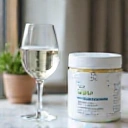 BioMax product in a lifestyle setting, next to a glass of water